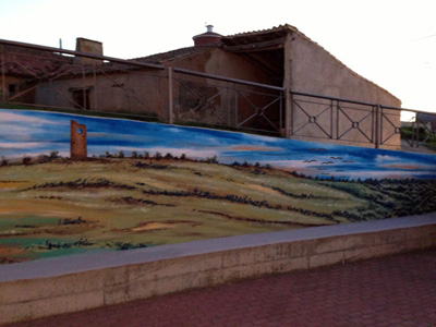 Pintura del mural de homenaje a la trashumancia
